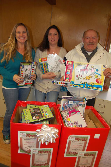 The Art Alliance of Idyllwild delivered new art supplies to the HELP Center for its Holiday Drive. HELP Center representatives Colleen Meyer and Skye Zanbrana, are shown here with Zack Steinhaus, AAI board member. Photo by Shana Robb