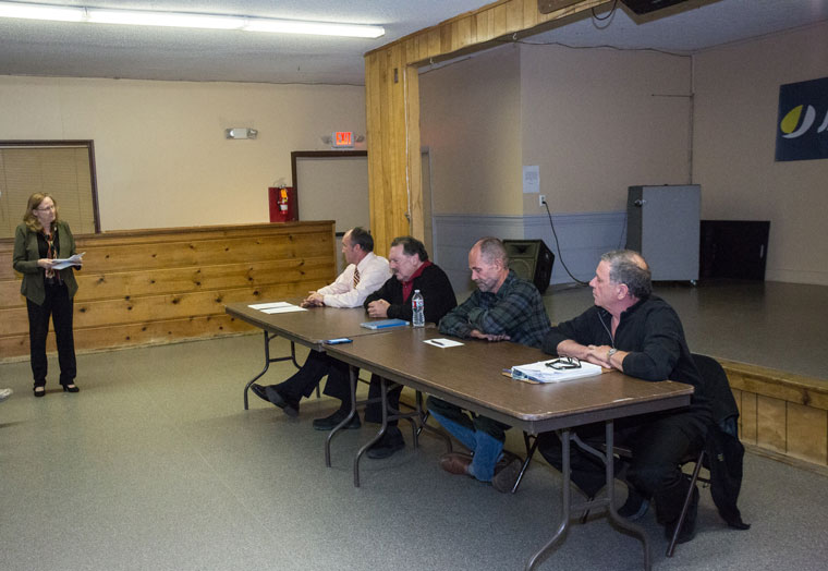 Shannon Ng moderated the forum for four individuals seeking to fill one of the two vacant seats on the Idyllwild Water District board last Thursday evening at Town Hall. From left, are Dr. Charles Schelly, Geoffrey Caine, David Hunt and Vic Sirkin.Photo by Peter Szabadi