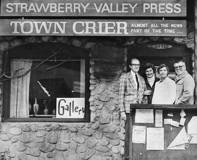 In May 1978, Luther and Marilyn Weare (left) pass the baton of the Idyllwild Town Crier to L.B. and Dorothy Hunsaker. Here, they pose on the steps of one of the little rock buildings that housed the newspaper up in Fern Valley. The Weares bought it from Ernie and Betty Maxwell in 1972. The Hunsakers owned it until 1989, a few months after Dorothy’s death. File photo