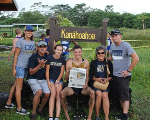 After finishing seventh in the 2016 Pac West Cross Country Championship on Oct. 22, Jayden Emerson of Idyllwild and a sophomore at California Baptist University, sat down with his family to look for results in the Town Crier. Accompanying him to Hawaii for the race were (from left) Jessica Priefer, mom; Roland Perales, grandfather; Peyton Priefer, sister; Margie Perales, grandmother; and a proud father, Brennen Priefer.Photo courtesy Jessica Priefer