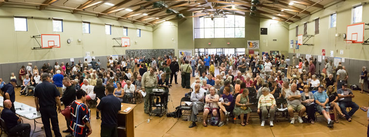 Hundreds listen to fire team and local leaders