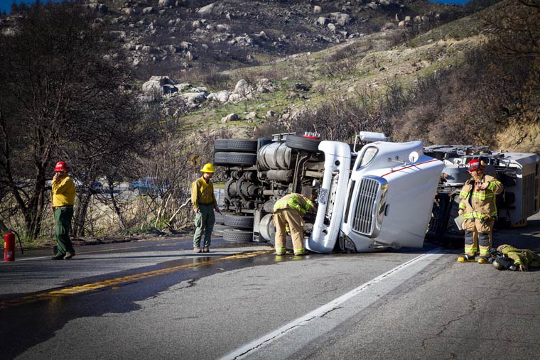 Truck overturns blocking 243 Friday night