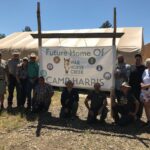 A stop at War Horse Creek for veterans in a covered wagon